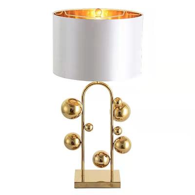 China Modern Indoor Home Decorative Metal Led Nordic Design Hotel Gold Bubble Bedroom Luxury Modern Table Lamps for sale