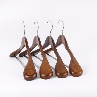 China Hot Sales Coat Hanger Dark Color Suit Hanger Wide Shoulder Solid Wood Seamless Stand Women's Eco-Friendly Coat Hanger for sale