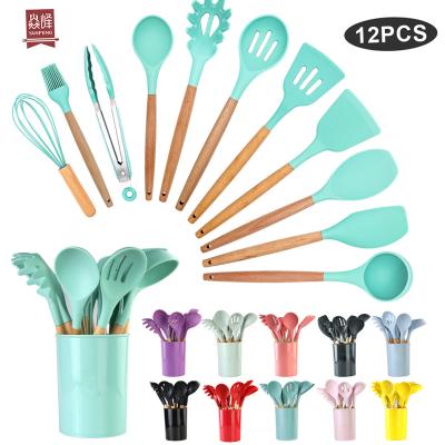 Cina 12 Pieces Accesorios de cocina Silicone Kitchen Set Hot Sustainable Private Label Kitchen Utensils in vendita