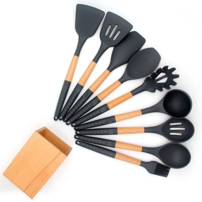 Chine Amazon Hot Selling Viable Silicone Utensil Set With Stand Cozinha 10pcs Wooden Handle Silicone Cooking Tools Kitchen Accessories Instruments à vendre