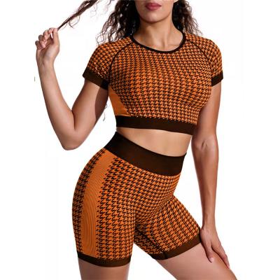 China Breathable Houndstooth Pattern Peach Hip Suit Quick-Drying Popular Seamless Training Wear Yoga Suit for sale