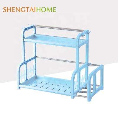 China High Quality Viable Factory Price 2 Tiers Spice Plastic Microwave Oven Shelf Rack Kitchen Storage Racks for sale