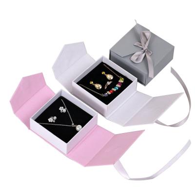 China Custom Jewelry Packaging Flip Paper Packing Bow Jewelry Magnetic Bracelet Ring Jewelry Boxes Earring Necklace for sale