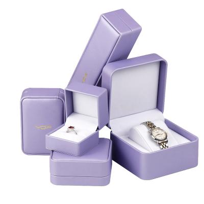 China Jewelry Packaging Customized Luxury Purple PU Leather Faux Leather Plastic Bulk Wedding Ring Jewelery Box Necklace Earring And Packaging With Logo for sale