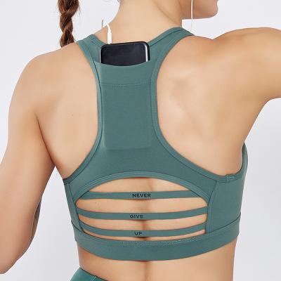 China Breathable Custom Running Yoga Sportswear Padded Seamless Racerback Activewear High Impact Women's Workout Sport Bra With Pocket for sale