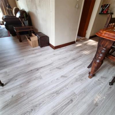 China Contemporary Glossy Germany Wood Technic Laminate MDF Gray Color Laminate Wood Flooring for sale