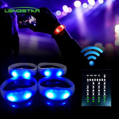 China Change color every time you press button party concert DMX bracelet Christmas decoration wholesale remote control led wristband led silicon wristband for sale