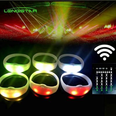 China Change color every time you press button 2021 standard concert party supplies luxury silicone LED wristband custom personalize logo for sale