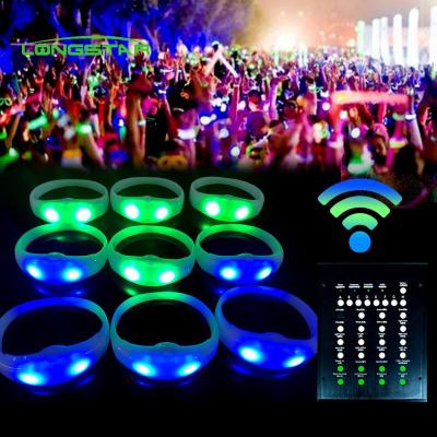 China Change Color Every Time You Press Button 2021 Custom Silicone Custom Flashing Radio Controlled LED Bracelet LED Wristband Remote Control for sale