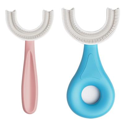 China Home Food Grade Brush Primary Oral Teeth Cleaning Design For Toddlers And Children Silicone Soft Kids U Shaped Toothbrush for sale