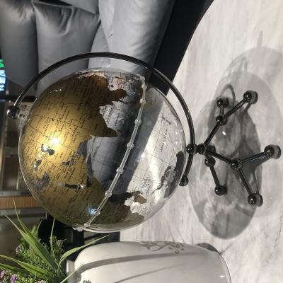 China Unique Design Transparent Ocean Clear Luminous Printing Decorative Globe With Heavy Duty Metal Stand For Modern Decor for sale