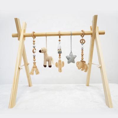 China Toy Luxury Wooden Baby Gym Educational Hanging Crochet Toys Baby Playsets Gym for sale