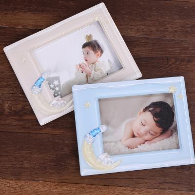 China New Innovative Style Kids Room Eco-friendly Decoration The Moon Shape Lovely Rabbit Baby Gift 6x4 Blue Rectangular Photo Frames for sale