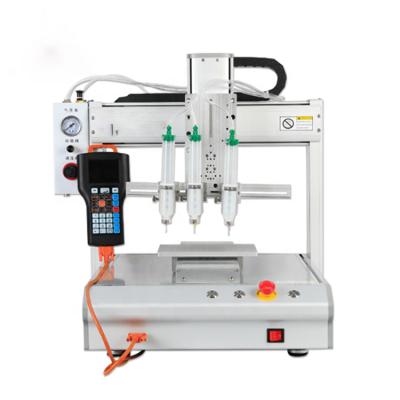 China Glue Dispensing Three-axis Table Top Gluing Machine , Earphone Horm Automatic Dispensing Machine for sale