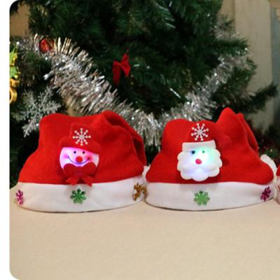 China Santa New Christmas Decorations Adult And Children Santa Hats Cartoon Snowman Elk Santa Hats for sale