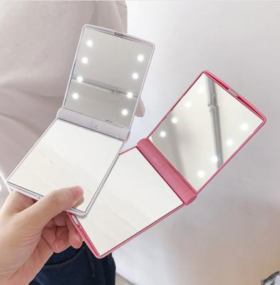 China Pocket Double Sided Mirror Light Up Travel Mirror Mini Makeup Mirror with 8 LED and Battery for sale