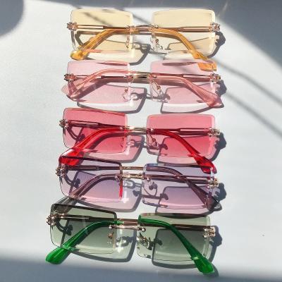 China Fashion Sunglasses 2022 Rimless Sunglasses 2021 Rectangle Glass Diamond Cut Ocean Lens Sun Vintage Fashion Women Small for sale