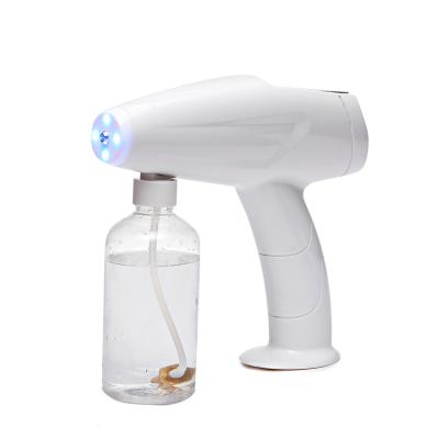 China Garden Gun Mini Handheld Blue Light Contact Spray Gun Atomizer Nano Electric Disinfection Gun for sale