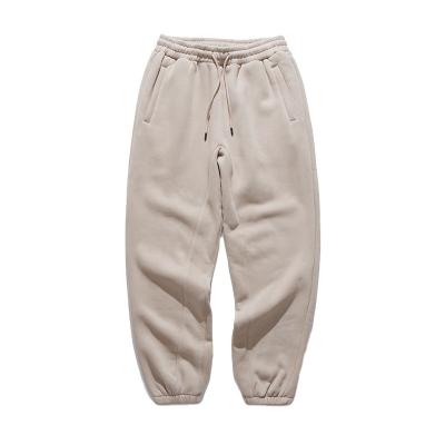 China Anti-wrinkle Fashion Style Autumn Men Cotton Polyester Baggy Solid Color Pants New Loose Shear White Sweatpants Male for sale