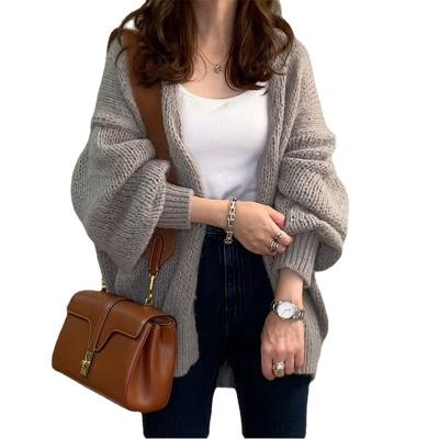 China Anti-wrinkle cardigan sweater women 2022 women fall clothes casual oversized cardigan V-neck puff sleeve sweater tops for sale