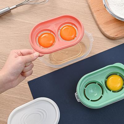 China Sustainable Egg Household Separator Filtering White And Yolk Separator With Storage Box for sale