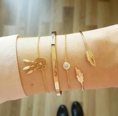 China FASHIONABLE Leaf Inlaid Diamond Arrow Opening Bangle Bracelet Women's Exaggerated Bangle Set for sale