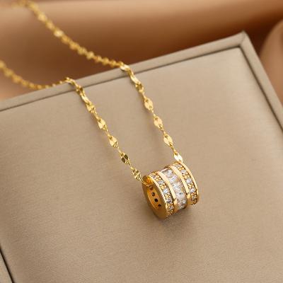 China 9 Trendy Styles New Gold Steel Titanium Diamond Rotary Roller Shapes Crystal Necklaces for sale