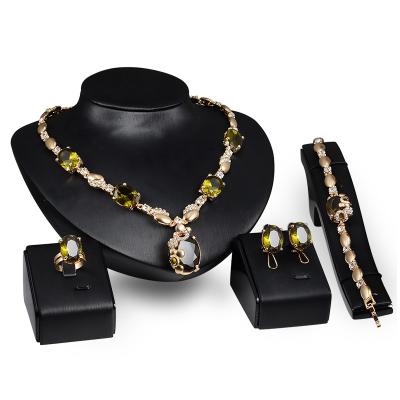 China Trendy Exaggerated Gemstone Necklace Earrings Bracelet Ring Four Pieces Boutique Jewelry Set Set for sale