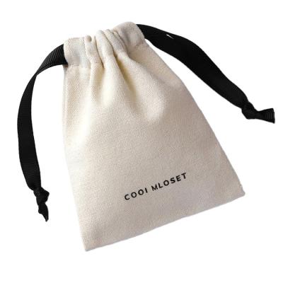 China Recyclable Hot Selling Portable Travel Canvas Drawstring Pull Rope Bag With Logo For Packing for sale