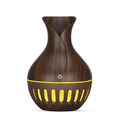 China Hotel 7 Colors Ultrasonic Humidifier Aroma Diffuser Humidifier 130ml Wood Grain Aroma Diffuser Mini Humidifier for sale