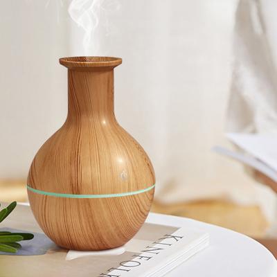 China Hotel Wood grain humidifier Ultrasonic Cool Mist Air Humidifier aromatherapy diffusers essential oil USB Mini Humidifier for home for sale