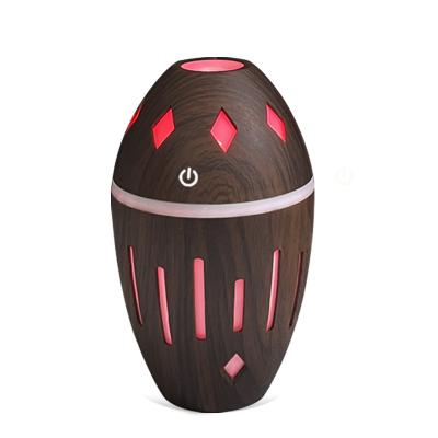 China Hotel 7 Color Led Night Light USB Wood Grain Ultrasonic Mist Air Humidifier For Home Office for sale