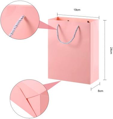 China Luxury Customized Reusable Handmade Pink Color Cardboard Paper Bags For Gift Package for sale