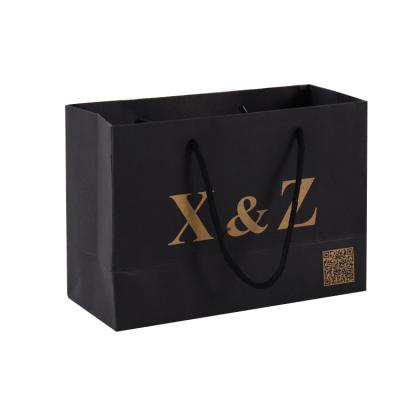 China Recyclable Custom Logo Printed Luxury Mens Clothing Coat Packaging Paper Shopping Bags for sale