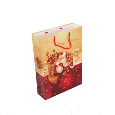 China Recyclable Custom Printed Christmas Paper Gift Packaging Bags for sale