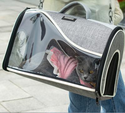 China New Breathable Pet Bag for Cats and Dogs Going Out Wearing Breathable Shoulder Carry Cat Bag for sale