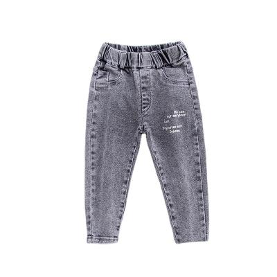 China 2022 Wholesale Kids Jeans 2-6years Fade Proof New Model Autumn Baby Pants Color Print Letter Pencil Pants Elastic Waist Jeans Pants For Girl for sale