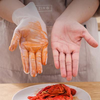 China Food Service Plastic Gloves Strip Embossed Disposable Strip Gloves Disposable Gloves for sale