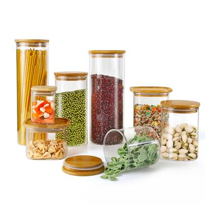 China Clear Set Spaghetti Container Tops Borosilicate Freshness Preservation Round Glass Storage Jar With Airtight Bamboo Lid for sale