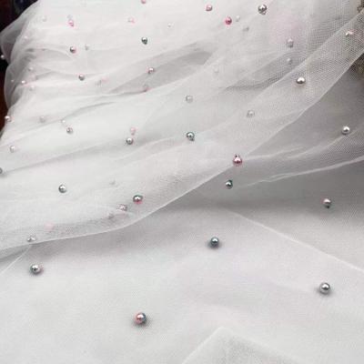 China Breathable 100%Nylon Tulle Multi Color Pearl Fabric Beaded Tulle Fabric For Dress for sale