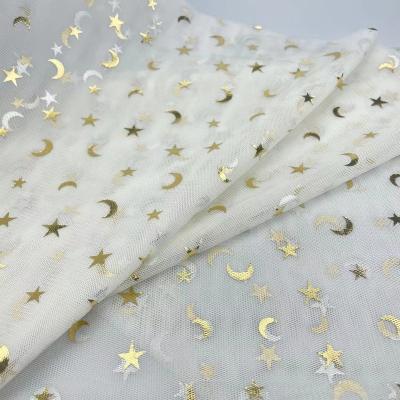 China 100% Polyester Star Tulle Fabric Foil Printing Durable Mesh Fabric For Dress for sale