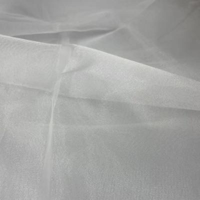 China Shaoxing Anti-static High Quality Fabric Wholesale 100%Polyester Organza Fabric Roll For Wedding Dress for sale