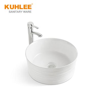 China Modern Round Sinks White Ceramic Hand Wash Bathroom Sink Basin Table Top Art Basin for sale