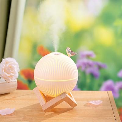 China Ultrasonic Essential Oil Humidifier H2O Humidifier 330ML Premium Air Humidifier USB Lake Car with LED Light for Home Office for sale