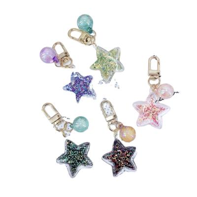 China 2021 Popular Models Sequin Explosion Star Key Ring Pendant Pearl Star Bag Transparent Acrylic Five-pointed Car Ornaments for sale