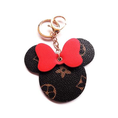 China Hot Sale Fashion Keychains Bow Pattern Design Keychain Luxury Designer Leather Key Chain Key Chain for sale