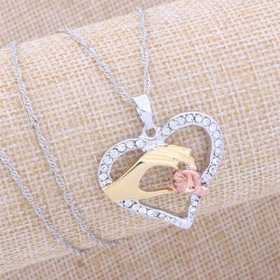 China New FASHIONABLE exquisite popular three-color diamond plating hand in hand mother's heart necklace for sale