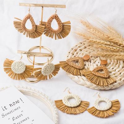 China 2022 design hot sale diy beaded 2022 new CLASSIC bohemian drop fashion straw beaded raffia flower palm tassel trends earrings for sale