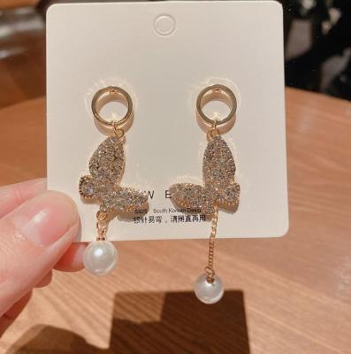 China 2021 New Design Trendy Asymmetrical Silvery Asymmetrical Long Drop Earrings Female S925 Butterfly Tassel Butterfly Earrings Female for sale