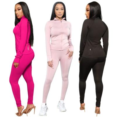 China Hot Selling Solid Color QUICK DRY Women's Joggers With Pockets Zipper 2 Piece Legging Set Women Long Jogging Sets Women for sale